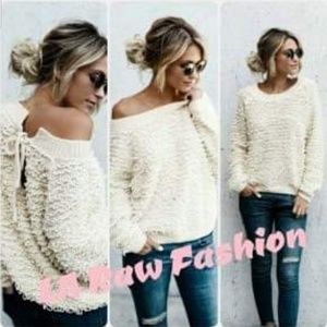 Off the shoulder sweater.